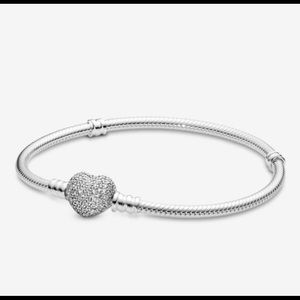 Pandora charm bracelet, heart shaped sterling silver with cubic zirconia.